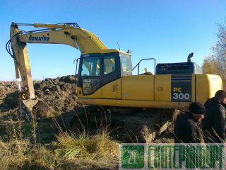   Komatsu PC300-7, 2010 . 